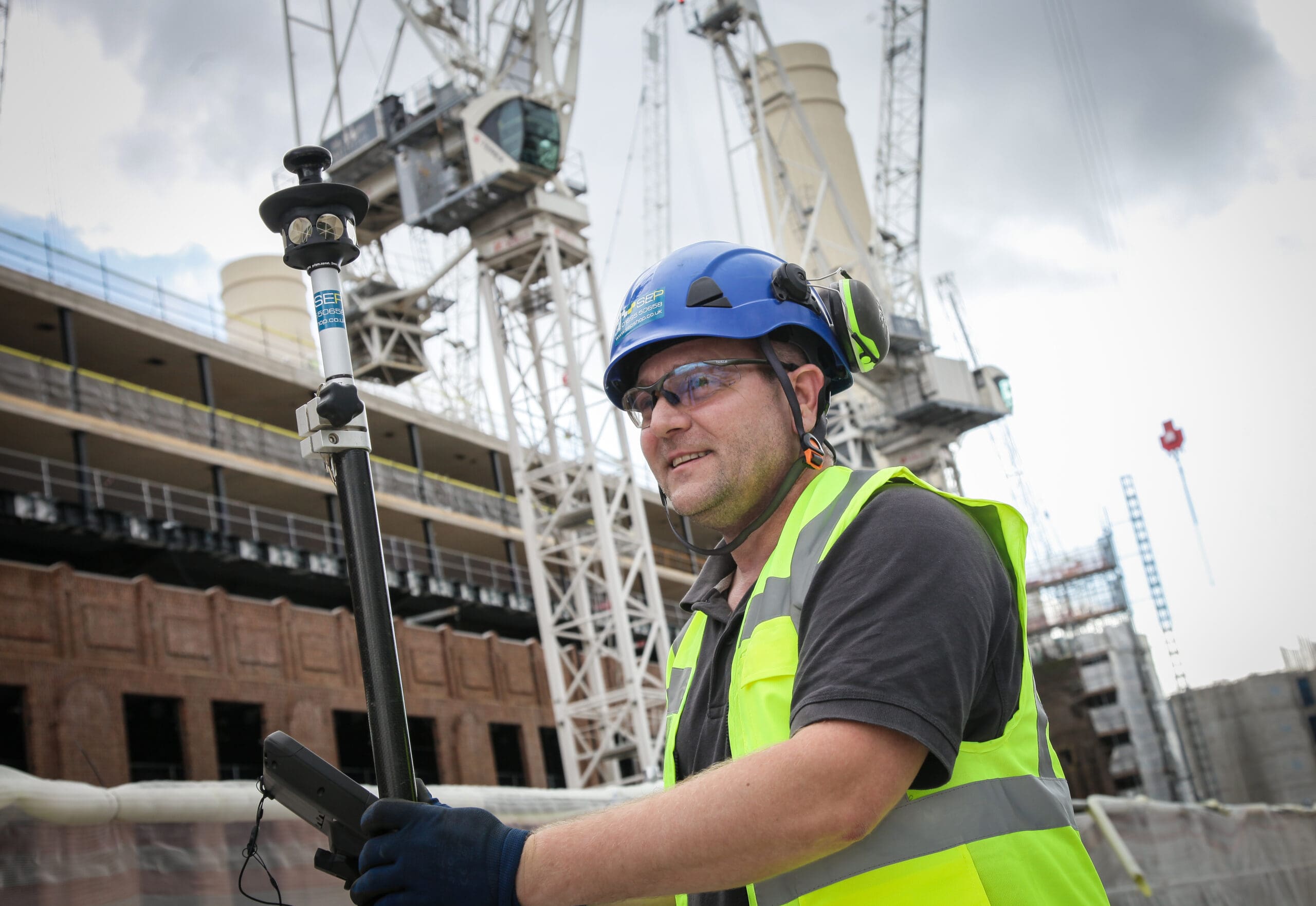 Setting out engineer in Sutton marking site layout