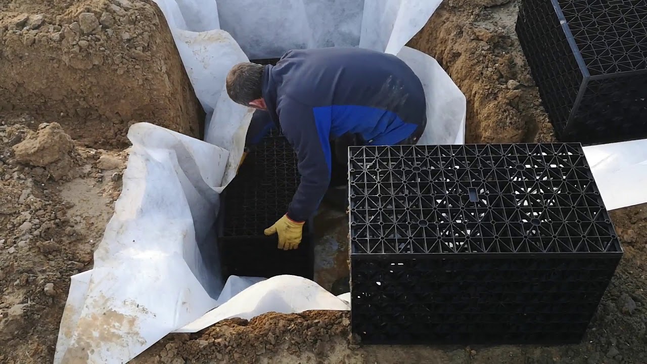 Soakaway installation in Sutton with mini digger